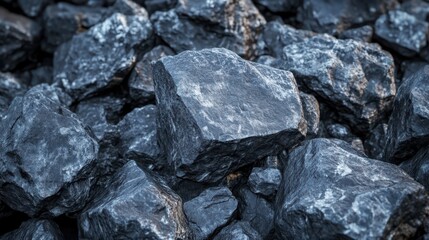 Coal fragments stacked together in a mining area during daylight hours