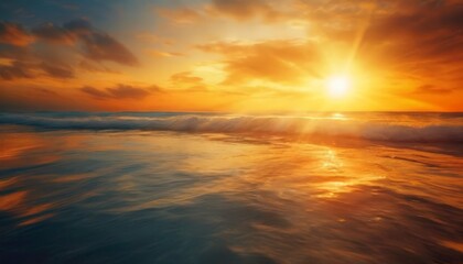 Fototapeta premium sunset over the ocean with waves and clouds
