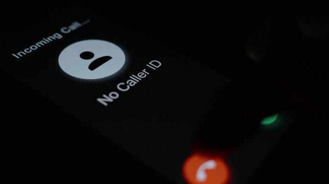 Finger approaching the green answer button for a call from "No Caller ID," symbolizing the dilemma to answer or decline.