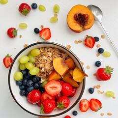 Bowl of Granola with Fresh Berry and Coconut Yogurt