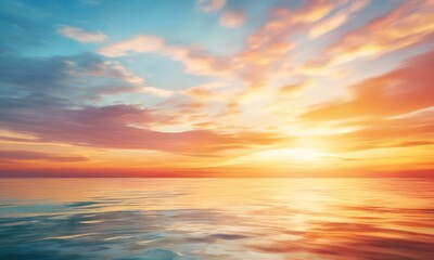 Obraz premium beautiful sunset over the ocean with clouds