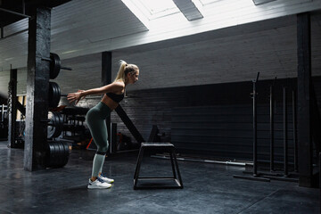 Female doing a box jump