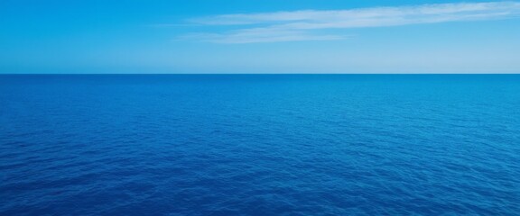 Obraz premium blue ocean with white cloud in the sky