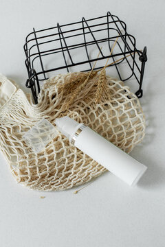 Creative set up of bottle with cosmetics 