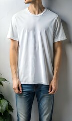 Obraz premium A clean and simple mockup of a man wearing a plain white t shirt.