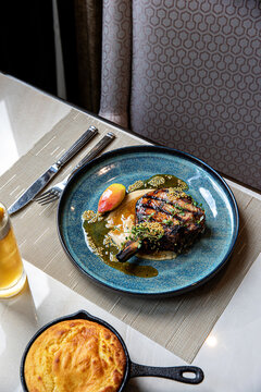 Bone in Porkchop with cornbread