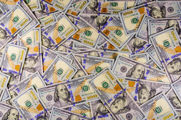 Background of one hundred dollar banknotes