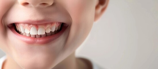 Fototapeta premium Children's teeth. The molars grow. Tooth growth anomalies.