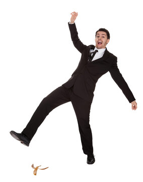 Businessman in a slippery situation - concept for accident claim