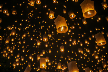 Obraz premium Sky Lantern Festival with Thousands of Glowing Lanterns Floating at Night