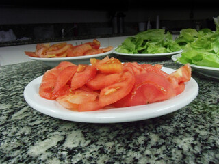 shrimp on a plate with salad