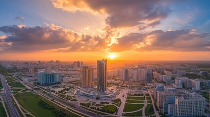 Obraz premium Sunset panorama of Astana (Nur-Sultan), Kazakhstan, showcasing the city's iconic buildings and urban landscape in a