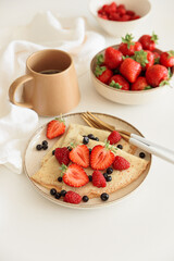 French homemade pancake crepes. Summer breakfast. Front view