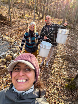 UGC Family selfie collecting maple sap in the forest