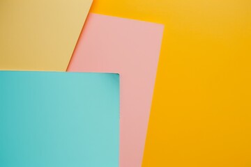 A minimalistic arrangement of colored papers in yellow, pink, and teal set against a bold yellow...