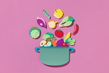 Fresh vegetables falling into the pot