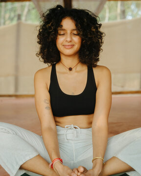 Women in Yoga practice finding Inner peace.