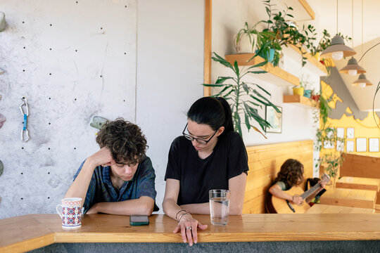 Young People Hanging Out in Rock Climbing Gym