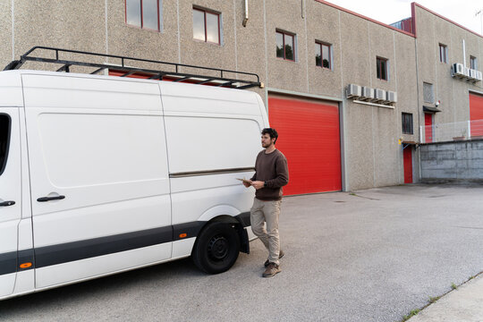 Delivery man working with his van