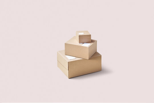 Three boxes in different sizes with attached white stickers
