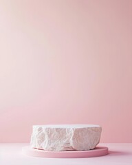 Minimalist Textured Stone Podium on Pastel Pink Background with Soft Glow and Gradient Effect