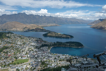 The aerial view of Queenstown cityscape and lake Wakatipu from the tourist viewpoint. This city is one of the most popular city of activities in New Zealand.