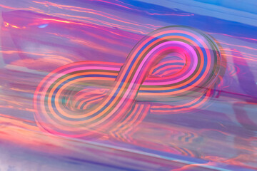 Infinite symbol visible through pink and blue glitched layer