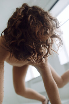 Woman with Curly Hair Dancing