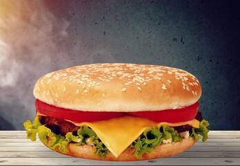 Delicious cheeseburger with cheese, meat and farmhouse bun