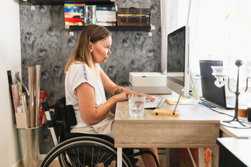 Empowered Woman with a Disability working in Home Office Environment