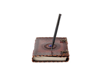 classic black fountain pen standing on antique notebook or leather or leather journal with carving and blue stone silver metal clasp, white or transparent background, horizontal foreground photo with 