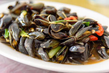 Stir-fried mussels. A delicacy from Chaoshan, China.



