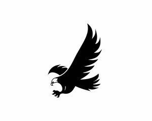 Flying eagle. Vector emblem. ...