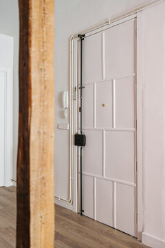 A securely locked white door
