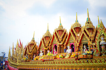 Fototapeta premium Yasothon Province, Thailand -11 May 2024 : Yasothon Rocket Festival The procession is decorated as a ritual to ask for rain to the angels to get water for agriculture. according to local beliefs