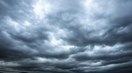 Overcast sky with dark clouds threatening rain, gloomy weather, moody atmosphere