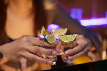 Enjoying a Refreshing Beer with a Lime Slice Placed on Top for Extra Flavor and Zest