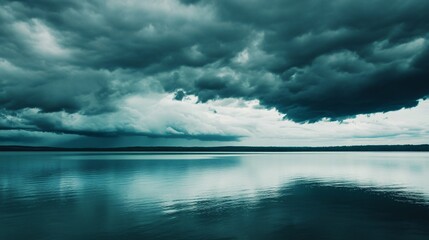 Storm clouds moving in over a calm lake, approaching weather, impending storm