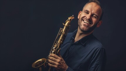 Fototapeta premium Smiling Man Holding Saxophone Against Dark Background, Expressing Joy and Passion for Music