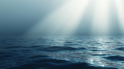 Fototapeta premium Light shafts piercing the clouds above the ocean on a stormy day