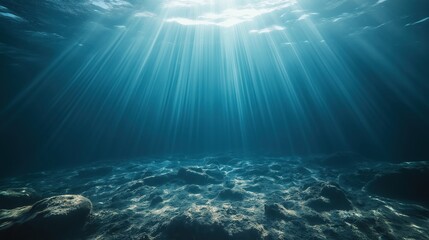 Obraz premium Light shafts piercing the ocean and illuminated whats beneath