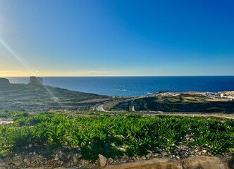 Panoramic view of the coast of the island of Gozo, Malta. Blue water of the Mediterranean Sea.