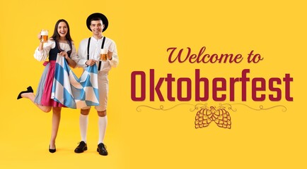 Young couple in traditional German clothes, with beer and Bavarian flag on yellow background. Oktoberfest celebration