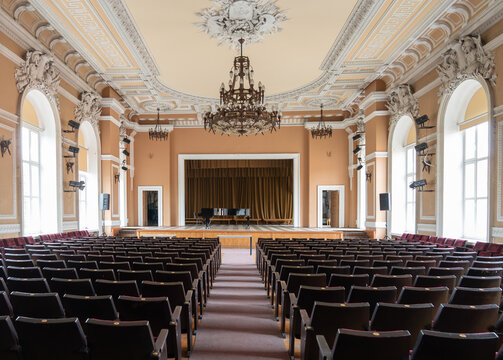 Spacious concert hall with grand piano