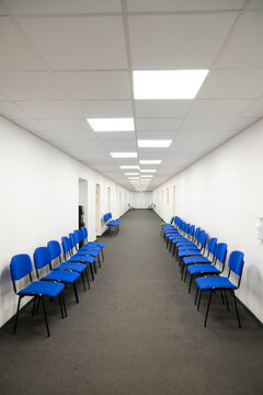 Long corridor with chairs aligned on both sides