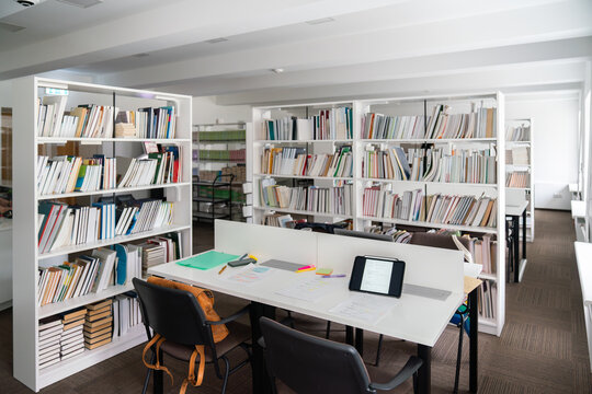 Library study area with bookshelves and study desk