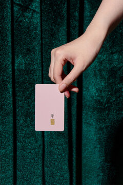 Payment for alcohol with hand hold a credit card