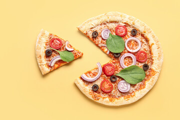 Tasty pizza with basil and tomatoes on yellow background