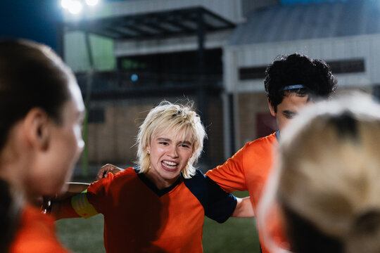Athlete giving a pep talk.