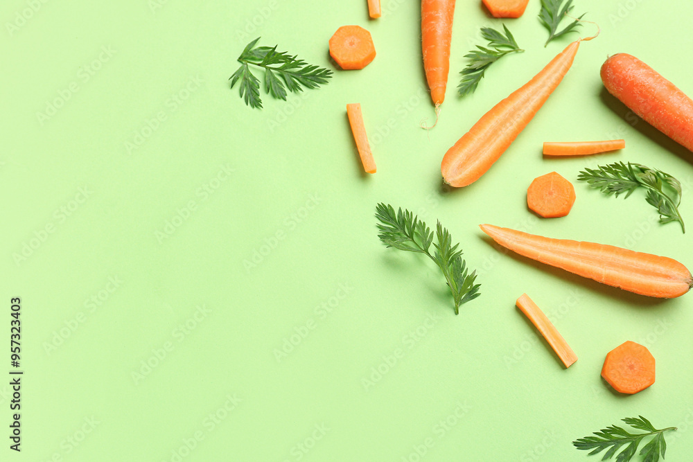 Canvas Prints fresh carrots and slices on green background